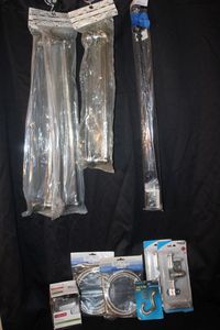 lot 119 image: SIP Curtain Rod, Towel Bars, Delta Rob Hook, Ice Maker Hoses, Coathat Hook and Sliding DoorGate Slide Lock.