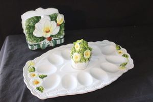 lot 132 image: Vintage 1950s Lefton Rustic Daisy porcelain deviled egg serving platter model 5182 with matching salt and pepper shakers. and porcelain napkin holder