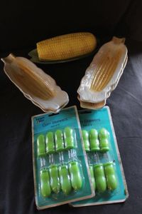 lot 133 image: Vintage ceramic corn-on-the-cob covered butter dish, ceramic corn-on-the-cob plates, and corn-on-the-cob holders SIP