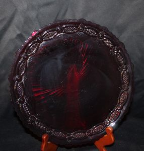 lot 157 image: Seven Vintage Avon Cape Code1876 Ruby Red Glass Dinner Plate, produced by Wheaton Glass Company Between 1975-1993