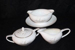 lot 160 image: Vintage Kaysons fine China Golden Rhapsody Sugar Bowl with lid, Creamer Pitcher and Gravy boat with attached underplate