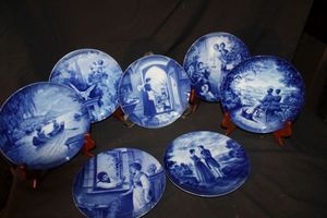 lot 186 image: Six German Blue and White Porcelain plates, often associated with manufactures like Berlin Design or Kaiser Featuring various romantic or historical scenes