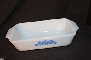 lot 188 image: Vintage Anchor Hocking Fire King Milk Glass loaf pan featuring the blue corn flower model #441