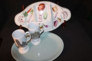 lot 189 image: Vintage ceramic pattern specifically for serving bagels with lox and various toppings and ceramic mugs