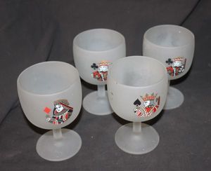 lot 200 image: Four Vintage-style frosted cocktail glasses featuring playing card suit and face designs.