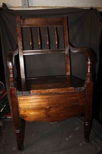 lot 202 image: Antique wooden commode chair, often referred to as a chamber pot chair