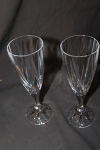 lot 211 image: Two Vintage Royal Gallery Monarch Pattern Crystal Champagne flutes, featuring a distinctive vertical cut design on the bowl and cut food