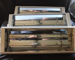 lot 234 image: Three Juno TBX39 Series Track Light fixture 120V Uses 3639-watt Biax Lamps with a 4-pin 2G11 Socket.&nbsp