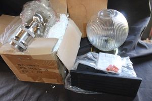 lot 246 image: Uspar CI-9GPBL Fluorescent Black Globe Light Fixture, Brushed nickel wall mounted handheld shower bracket kit, Horizontal indooroutdoor Aluminum Louvered Step Light, Round Glass lighting fixture.