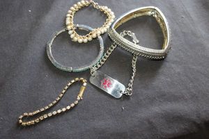 lot 268 image: Four Fashion Bracelets, and 1 Medical Alert Penicillin Allergy Bracelet.