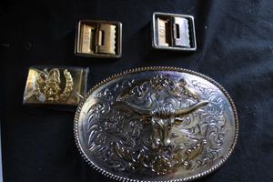 lot 265 image: Four Belt Buckles