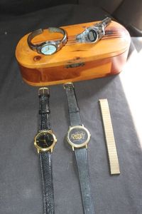 lot 263 image: Wooden Box with Lid, Vintage Watches, Silver-tone cuff bracelet watch, Timex digital wristwatch, 1970s-1980s, Gold-tone bezel and black textured leather wrist strap watch, and kodak 1996 Olympic Games Commemorative watch.