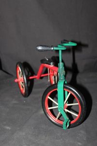 lot 295 image: Miniature metal doll tricycle&nbsp