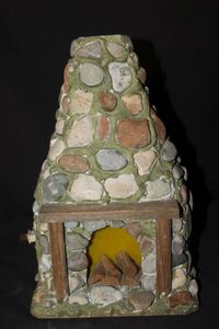 lot 299 image: Vintage-style miniature stone fireplace, typically used as a decorative accent in dollhouses or dioramas