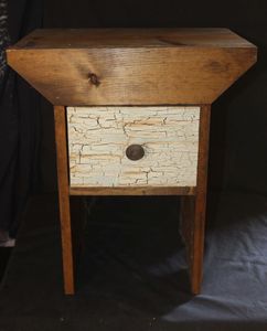 lot 302 image: Rustic wooden side table features a drawer with distressed, cracked white paint finish.