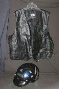 lot 303 image: Motorcycle Gear, Black Leather Vest and Harley Davidson Helmet