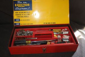 lot 322 image: Vintage A.C. Gilbert Erector Set case with tools inside