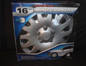 lot 333 image: Four aftermarket wheel covers 16in silver alloy with lacquer finishing&nbsp for gm vehicles appear unused