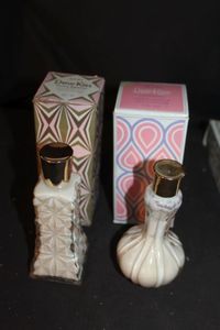 lot 366 image: Two Vintage Avon Decanter bottles with Orginal boxes. Collectible Dew Kiss clear glass bottles with lids and original boxes