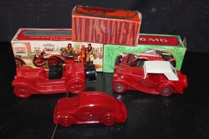 lot 389 image: Three Red vehicles all with boxes