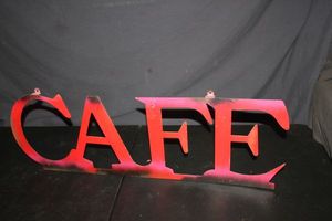 lot 437 image: Metal Cafe Wall Sign