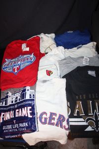 lot 442 image: Sports Team Shirts, Mostly Texas Teams