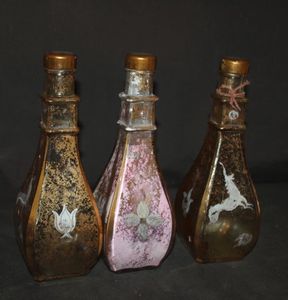 lot 480 image: Neiman Marcus Gold Perfume Bottles