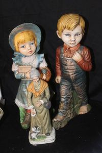 lot 513 image: Boy And Girl Ceramic Figures Approx 20 inches tall and shorter figure