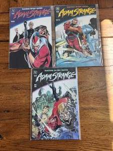 lot 109 image: Selection of vintage DC Comics - Adam Strange - Book 1,2,3