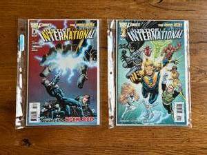 lot 199 image: Selection of vintage DC Comics - Justice League International - 1 and 2