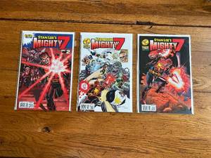lot 204 image: Selection of vintage Stan Lee Comics - Stan Lees Mighty 7 - 1 and variant 1 and 2