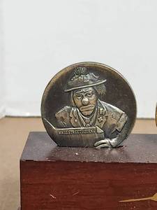 Vintage Emmett Kelly Jr Flambro medallion collection and display