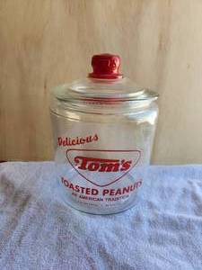 lot 20 image: Vintage Delicious Toms Toasted Peanuts-An American Tradition Glass Jar Red Knob Lid
