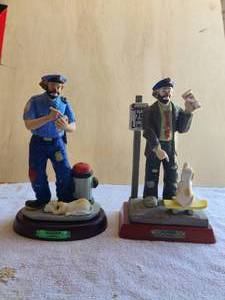 lot 102 image: Lot of 2 - Vintage Emmett Kelly Jr Flambro Porcelain Clown Figurine - Policeman with dog - wood base - hand signed and Weary Willie - Policeman - wood stand - signed and dated