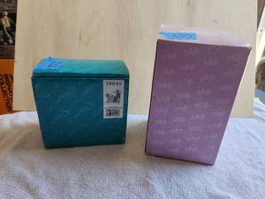 lot 156 image: Lot of 2 - Vintage collectible Emmett Kelly Jr. clown figurine - The World Traveler - Hand signed - in box and Vintage collectible Emmett Kelly Jr. clown figurine - music box - Hand signed - in box