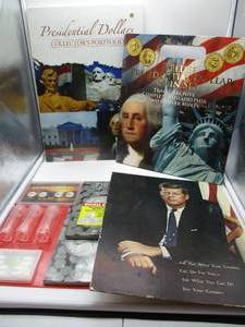 lot 4 image: Coin Collectors Set (no coins) and JFK