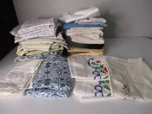 lot 25 image: Used Various Pillow Slips  and Embroidered Ones