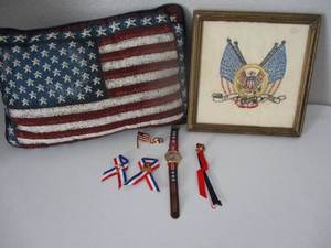 lot 30 image: Americana Items - Pillow, Pins, Watch (needs new battery) and Vintage Need Point Wall Hanging