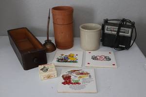 lot 43 image: Vintage Trivets, Copper Eagle Oil Can, Vintage GE Radio, Sewing Drawer, Wine Crock, StarrX Bottle Opener