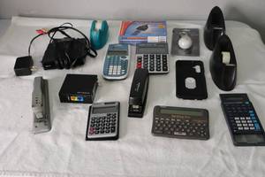 lot 67 image: Calculators, Staplers, Tape Dispensers, Roku, Memory Stick, and others