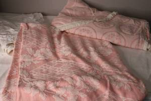 lot 69 image: Two Vintage Pink Linens and Tablecloth