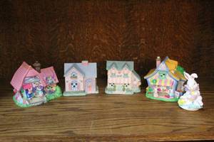 lot 99 image: collectible vintage porcelain figurines from an Easter village set,