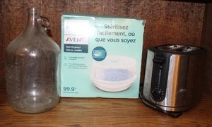 lot 109 image: Toaster Microwave Steam Sterilizerglass jug with a built-in finger loop