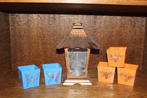 lot 115 image: Lantern Hurricane Candle Holder. And metal decorative boxes