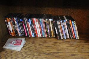 lot 134 image: Lot of  DVDs took pictures of all see pictures for titles