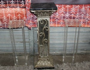 lot 4 image: decorative Corinthian-style pedestal column, and 2 plastic ones as well