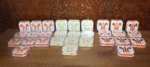 lot 16 image: lot of generic 3.5mm wired earbuds with remote and microphone, packaged in clear plastic card-sized cases