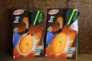 lot 149 image: Two Nerf Vortex Aero Howler foam football that glow in the dark