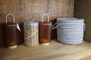 lot 156 image: Round Black and White Cotton Rope Decorative Storage Basket with Handles. And 2 candle holders and wicker storage canister