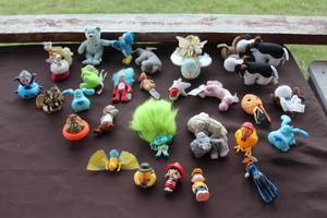 lot 33 image: collection of miniature figurines, including troll dolls and various animal figures